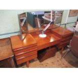 A circa 1970's Avalon teak dressing table,