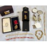 A silver gilt Masonic medal with ribbon and bar in fitted case, together with another similar,