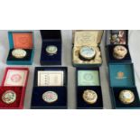 A collection of presentation boxed Halcyon Days enamelled boxes of varying designs,