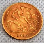 A 1915 gold half sovereign.