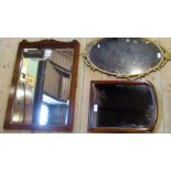 A Victorian mahogany wall mirror with plain arched plate,