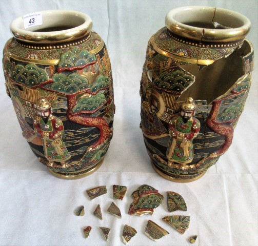 A pair of Japanese Taisho period satsuma vase, with raised decoration (one AF).