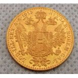A 1915 Austrian gold coin.