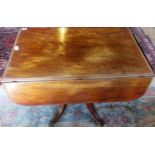 An early 19th century mahogany drop leaf centre table,