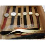 A collection of gentleman's quartz and other wristwatches, including: Swatch,