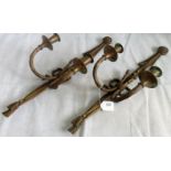 A pair of Louis XVI-style gilt brass wall sconces of tied reed form.