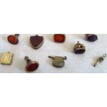 A mixed lot of variously mounted fobs and seals, bloodstone set watch key and other items.