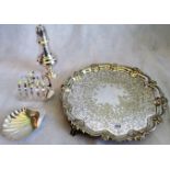 A silver plated piecrust form tray, with floral engraving on three florally cast feet,