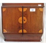 A marquetry inlaid mahogany two door correspondence cabinet,