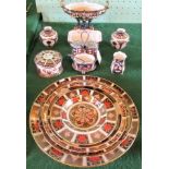 A collection of Royal Crown Derby Imari wares, to include: boat shaped table centre, squat vase,