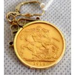 A 1912 gold sovereign in decorative pendant mount.