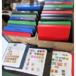 A collection of 23 stamp albums, containing many UK, European and world stamps.
