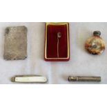 A silver card case, penknife, scent bottle, lapel pin and a white metal lady's mood indicator.