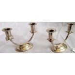 A pair of Art Deco design EPNS twin sconce table candelabra.