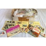 A collection of miscellaneous tea card albums and other decorative trade cards and albums.
