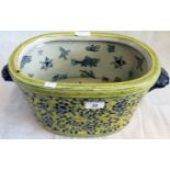 An 18th century-style two handled Chinese porcelain foot bath,