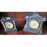 A later Victorian black Belgian marble mantle clock,
