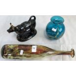 A black glazed 19th century Jackfield cow creamer & cover and two items of Mdina studio glassware.