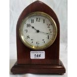 An Edwardian parquet string inlaid eight day mantle clock of Gothic lancet arch form,
