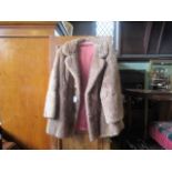 A lady's vintage half-length mink jacket.