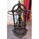 A late Victorian black painted cast iron stick stand in the Coalbrookdale style.
