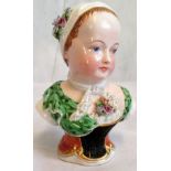A 19th century Continental porcelain bust of a child in the manner of Morrison.