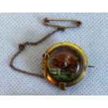 A Victorian Essex crystal brooch, the circular aperture depicting a jumping horse and jockey,