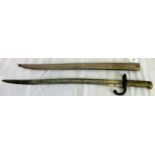A late 19th century French chassepot sword bayonet and scabbard.