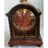 A George III design mahogany cased eight day mantle clock, chiming on a series of coiled gongs,