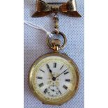 A 14ct gold Swiss fob watch with gilt inner case.