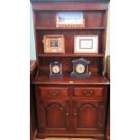 A reproduction oak tall dresser,