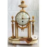 A late 19th century French eight day white marble and gilt metal drum head Portico clock,