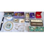 A mixed lot of costume and paste set jewellery, including: a 9ct gold signet rig, pick axe charm,