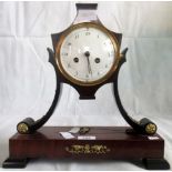 A French 19th century Empire design mantle clock,