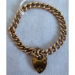 A 9ct gold curb pattern bracelet with padlock clasp. Condition Report: 12.8 grams.