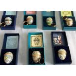 A collection of eight presentation boxed Halcyon Days eggs, to include: Easter 1980,