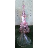 A Nailsea-type pink and white swirled decorative hand bell and a 19th century glass funnel dish.