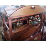 A reproduction mahogany butler's tray of George III-type, on a four leg stand.