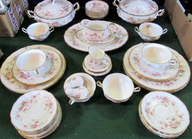 A Paragon 'Victorian Rose' pattern part-dinner service, to include: covered tureens, soups,