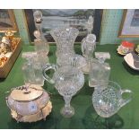 A collection of twelve items of cut and moulded glass, to include: decanters, large lemonade jug,