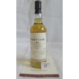 A bottle of 1990 First Cask Dalmore Highland Single Malt Scotch Whisky.
