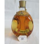 A bottle of Dimple Deluxe Scotch Whisky.