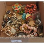 A quantity of costume jewellery, to include: brooches, necklaces and earrings.