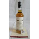 A bottle of 1993 First Cask Ben Nevis Highland Single Malt Scotch Whisky.