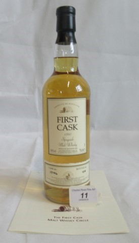 A bottle of 1980 First Cask Glenlivet Speyside Single Malt Scotch Whisky.