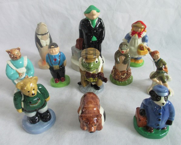 A collection of eleven Wade Whimsies, to include: Andy Capp, Toad Wind in the Willows, Camping Bear,