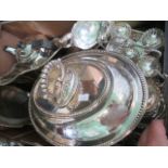 A large quantity of silver plate, to include: vegetable dish and cover, gravy boat,