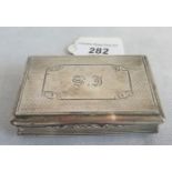 A silver box having hinged lid,