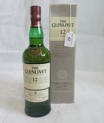 A bottle of Glenlivet 12 Year Old Single Malt Scotch Whisky.