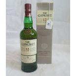 A bottle of Glenlivet 12 Year Old Single Malt Scotch Whisky.